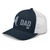 Navy/White six-panel mesh-back trucker cap with embroidered New York DAD logo, left-front view — DAD all caps