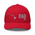 Red six-panel mesh-back trucker cap with embroidered Hawaii DAD logo, front view — DAD all caps