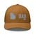 Caramel six-panel mesh-back trucker cap with embroidered Georgia DAD logo, front view — DAD all caps