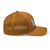 Caramel six-panel mesh-back trucker cap with embroidered Georgia DAD logo, right side view — DAD all caps