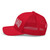Red six-panel mesh-back trucker cap with embroidered USA DAD logo, left side view — DAD all caps