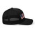 Black six-panel mesh-back trucker cap with embroidered USA DAD logo, right side view — DAD all caps