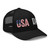 Black six-panel mesh-back trucker cap with embroidered USA DAD logo, right-front view — DAD all caps