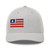 Silver six-panel mesh-back trucker cap with embroidered Flag DAD logo, front view — DAD all caps