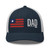 Navy/White six-panel mesh-back trucker cap with embroidered Flag DAD logo, front view — DAD all caps