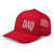 Red six-panel mesh-back trucker cap with embroidered Flag DAD logo, left-front view — DAD all caps