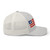 Silver six-panel mesh-back trucker cap with embroidered Flag DAD logo, right side view — DAD all caps