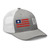 Heather Grey/White six-panel mesh-back trucker cap with embroidered Flag DAD logo, right-front view — DAD all caps