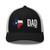 Black/White six-panel mesh-back trucker cap with state flag color embroidered Texas DAD logo, front view — DAD all caps