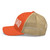 Rustic Orange/Khaki six-panel mesh-back trucker cap with state flag color embroidered Texas DAD logo, left side view — DAD all caps