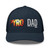 Navy six-panel mesh-back trucker cap with embroidered Pyro DAD logo, front view — DAD all caps