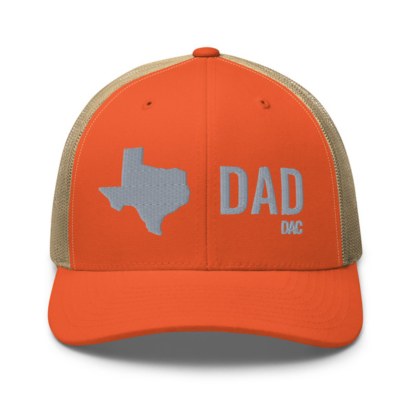 Rustic Orange/Khaki six-panel mesh-back trucker cap with embroidered Texas DAD logo, front view — DAD all caps