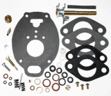 Allis-Chalmers WD45 D17 Marvel Schebler Carburetor Repair Kit, assortment of gaskets, screws, springs, and small engine repair parts laid out on a white background.