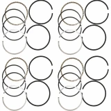 Four repeated sets of black, silver, and gold-toned piston rings arranged on a white background for an Allis-Chalmers B, C, or CA farm tractor with a four-cylinder engine.