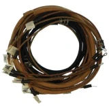 Coiled wiring harness kit for Allis-Chalmers B, C, CA, and IB farm tractors, with brown fabric-braided wires, black leads, connectors, and labeled terminals.