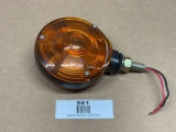 Round Fender and Cab Mount Amber Warning Light, display of the amber warning light with a round, orange lens and mounting hardware.