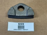 Allis Chalmers B C IB Rear Wheel Clamp Eccentric Style, display image showing a used, metallic wheel clamp with a circular hole, placed on a brown background with a white label reading '659 USED PARTS / DISPLAY'.