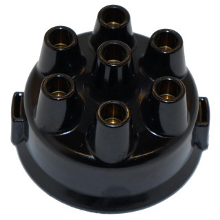 Allis-Chalmers Allis Chalmers D19 Distributor Cap Delco, black ignition distributor cap with multiple terminal openings for engine spark plugs.