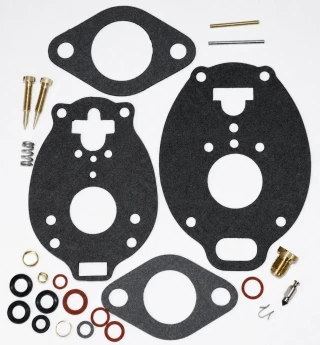 Allis-Chalmers Economy Carburetor Repair Kit for Marvel Schebler Allis-Chalmers, assortment of gaskets, screws, and small parts for carburetor maintenance.