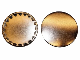 Allis-Chalmers D Series 1" Snap-In Hole Plug 9563K47, two metallic gold-colored hole plugs with a smooth and textured surface, one with a snap-in design and the other plain.