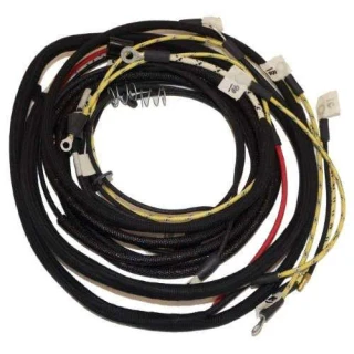 Coiled Allis-Chalmers wiring harness kit for WD and WD45 farm tractors, with black braided wiring, colored leads, connectors, and metal terminals.