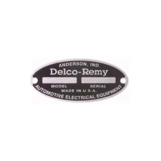 Large blank aftermarket starter tag for Delco Remy 6V, oval-shaped with black background and white text. It has holes on each side for attachment and is designed for Allis-Chalmers farm tractors, not automobiles.