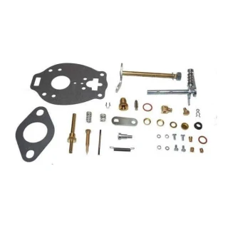 A complete carburetor kit for Allis-Chalmers CA farm tractor, including various metal and rubber parts such as gaskets, screws, springs, and mounting hardware.