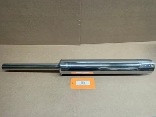 Allis-Chalmers B CA C D10 D12 Stainless Steel Muffler, shiny chrome motorcycle or tractor muffler with a long cylindrical shape.
