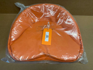 Orange Tractor Seat Pad Cushion 19 inches, displayed in clear plastic packaging.