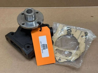 Water Pump for Allis-Chalmers D21, 180, 185, 190, 190XT on display with gasket and packaging.