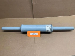 Allis Chalmers B IB C CA RC Muffler, display view of a cylindrical metal muffler with attached pipes and a label, used for vintage tractor exhaust system.