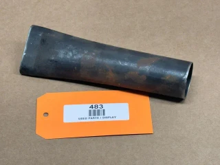 Exhaust Manifold Side Pipe for Allis Chalmers WC WF, display showing a rusty metal pipe on a beige background with an orange tag labeled '483' and 'USED PARTS / DISPLAY'.
