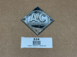Allis Chalmers ED40 D10 D12 D14 D15 D17 D19 D21 Steering Wheel Front Nose Emblem, display showing a silver metal emblem with 'A C' and 'Allis-Chalmers' engraved on it.