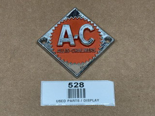 Persian Orange #1 Emblem for Allis-Chalmers Steering Wheel and Front Nose, displayed on a cardboard surface.