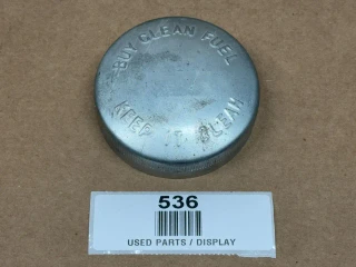 Buy Clean Fuel Fuel Cap for Allis Chalmers and IH, display of a round, metallic fuel cap with embossed text 'Buy Clean Fuel' and 'Fits 1/4'