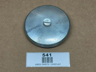 Allis Chalmers Fuel Cap for D21, 190, 190XT, 200, 210, 220 with display, close-up image showing metallic fuel cap on a brown background.