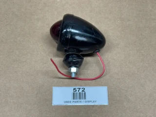12-Volt Bullet Style Tail Light for Allis Chalmers B C CA G WD WD45 D10 D12 D14, black with red wiring and a red lens, used for tractor lighting.