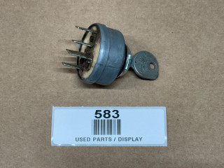 Allis Chalmers Ignition Switch Key Switch, display of used ignition switch with a key attached.