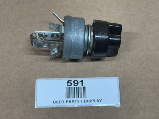 Allis-Chalmers Light Switch w/ Knob 70249142, display image of a used electrical switch for machinery with metal and black plastic components and a knob for operation.