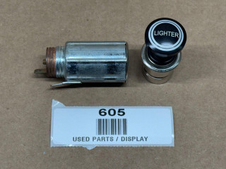 Cigarette Lighter for Allis Chalmers, Case, Cockshutt, IH, John Deere (Display), used parts with metal body and black top labeled 'LIGHTER' on a brown background.