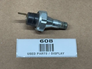 Allis-Chalmers Engine Oil Pressure Switch D21 180 185 190 190XT 190XT III 200 210 220, display image of a used engine oil pressure switch with metallic body, threaded end, and electrical contact.