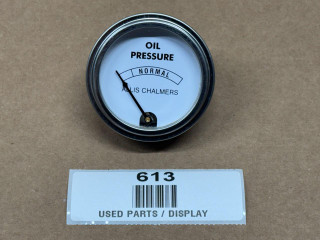 Allis Chalmers Oil Pressure Gauge, display of an oil pressure measurement device with needle indicating normal oil pressure level.