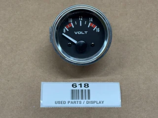 Voltage Meter 8 to 16 Volt with Display, round automotive analog volt meter showing voltage reading on black face with white and red markings.