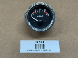Voltage Meter 8 to 16 Volt with Display, showcasing a round analog gauge with a needle pointing to approximately 8 volts on a black dial face with white and red markings.