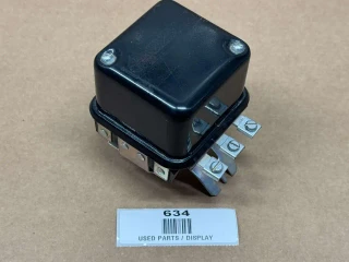 6 Volt Voltage Regulator for Allis-Chalmers, black rectangular display unit with electrical terminals on the side, used parts display