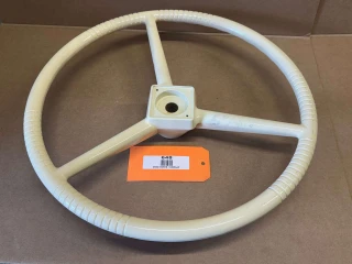 Allis Chalmers Cream Steering Wheel, display view of a vintage tractor steering wheel with a cream-colored finish and three-spoke design.