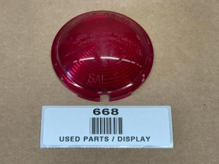 Allis Chalmers Bullet Tail Light Lens Plastic D14 D15 D17, display of a used red tail light lens for tractor tail light assembly.