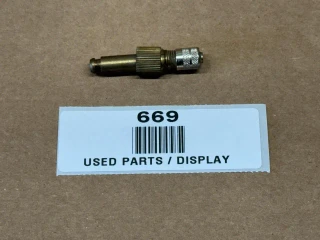 Rear Tire Inner Tube Valve for Tractor Tubes with External Threads, display of the valve on a cardboard surface with a label.