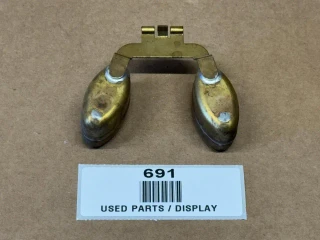 Zenith Carb Float for Allis-Chalmers WD45, D15, D17, display of used carburetor float with metallic components and mounting clip, on brown background with part label.