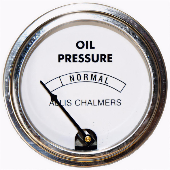 Allis-Chalmers Oil Pressure Gauge, circular engine oil pressure indicator showing normal range and needle pointing to low pressure.